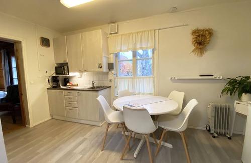 Rovaniemi Apartment | LAURI Historical Log House Manor