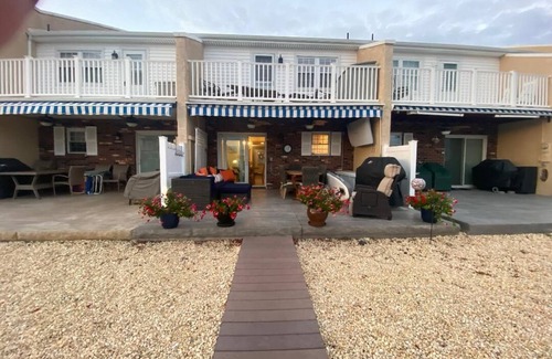 Dover Beaches North House | Lavallette Beautiful Bay front townhome with a pool and short walk to the beach