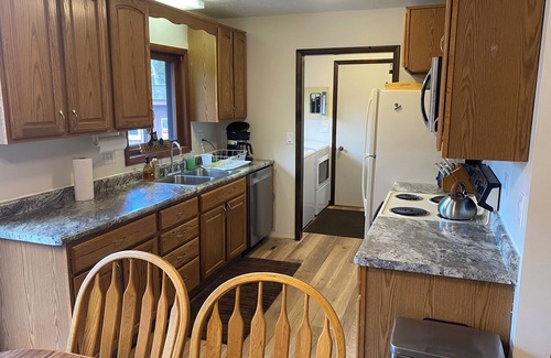Cadillac House | Lazy Acorn "The Yellow Perch" on Lake Mitchell