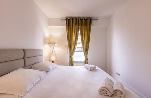 Le Suquet House | LB Vacation Rentals I High Floor Sea View 2Br Apt with Balcony & Garage