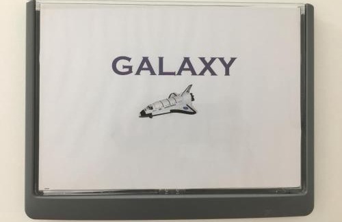 Centre Ville Apartment | Le Galaxy centre la Brèche wifi calme vue jardin