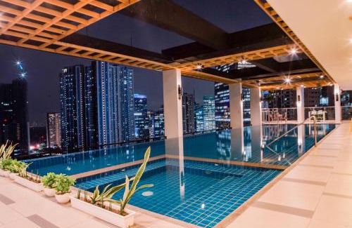 Bonifacio Global City Apartment | Le Martell 1BR BGC Condo Unit - Infinity Pool & Gym Access with 360 City View