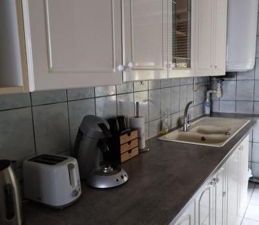 Mulhouse Apartment | Le Thannois - appartement 2 chambres, salon, cuisine équipée, parking et wifi gratuit