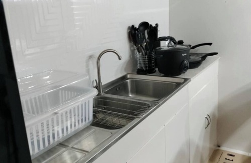 Naga Condo | Léo's Cachette: Your Modern Cityscape of Comfort and Convenience in Naga City