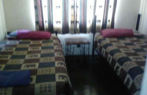 Victoria Falls Cabin | Leopard Room with double bed