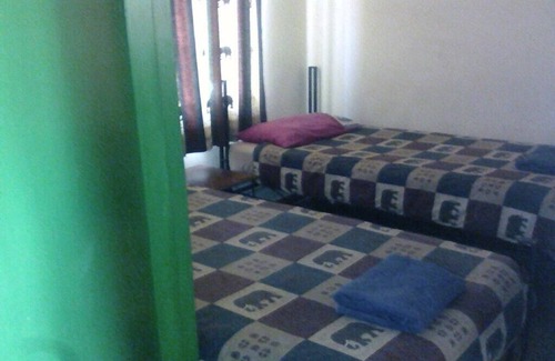 Victoria Falls Cabin | Leopard Room with double bed
