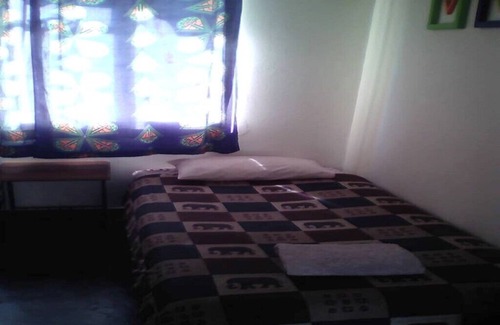 Victoria Falls Cabin | Leopard Room with double bed