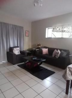 Hurlyvale Apartment | Libem 4 Family Room