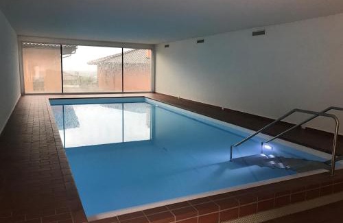 Muralto Apartment | Lichtdurchflutete Ferienwohnung mit Panorama-Sicht und Schwimmbad/Sauna