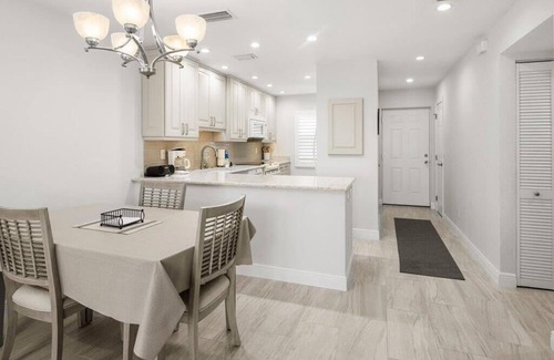 Marco Island Condo | Light and Bright Walk to the Beach Condo