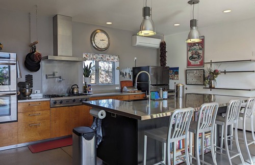 La Cienaga House | Light-filled main house close to town; views, hiking on high desert behind house