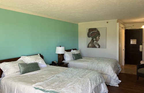 Hanamaulu Hotel | Light filled room, just steps to the beach