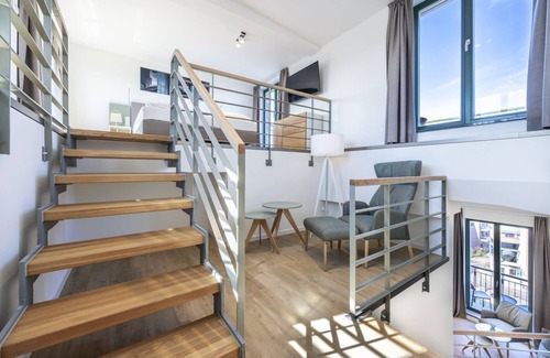 Wismar Apartment | Light-flooded harbor apartment with panoramic view, roof terrace and balcony