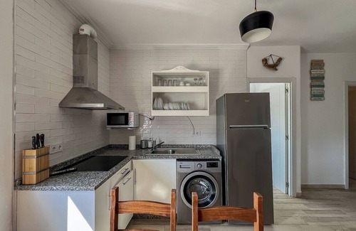 Bolonia Apartment | Lightbooking Carpe Diem 2 dormitorios