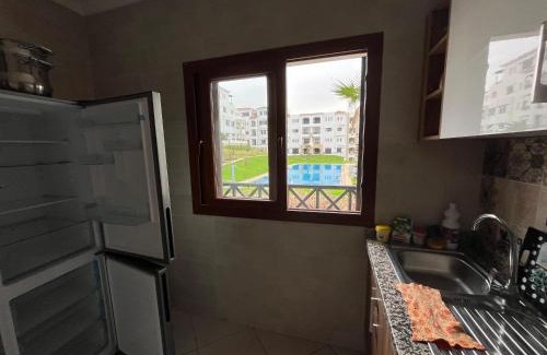 M'diq Apartment | Lilac's Garden vue piscine