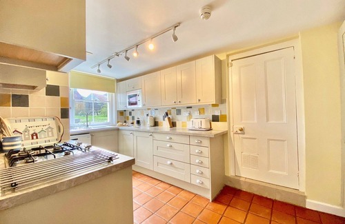 Freshwater House | Little Halt is a charming 17th century thatched cottage overlooking Pound Green