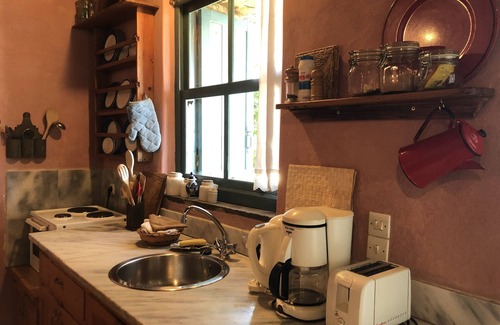 Volissos House | LITTLE HOUSE, a Charming Stone Built House with Fantastic Views