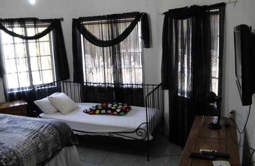 Runaway Bay House | Little Savoy Guest House