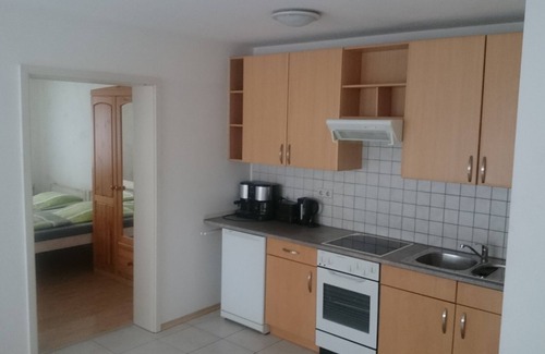 Lahr Condo | Living on the edge of the city and forest. Experience a mix of proximity to the city and green nature.