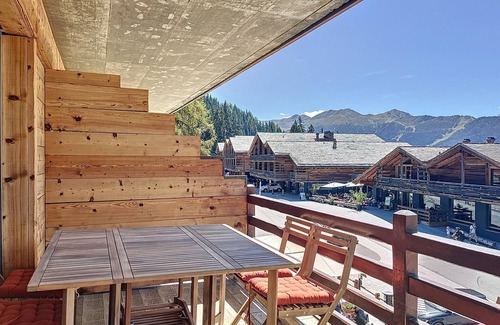 Verbier Apartment | Living room with sofa bed, open-plan kitchen with 3 hotplates and Nespresso coffeemachine, small dis