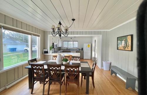Traverse City House | Located directly on East Grand Traverse Bay with sandy beach