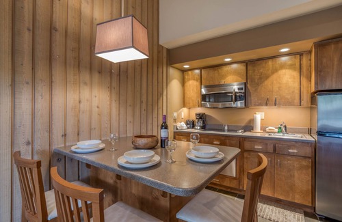 Century West Condo | Location and Privacy in This Upper-Level Condo with Extra Amenities!
