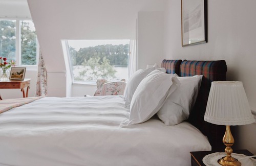 Elgin Cabin | Lochside Luxury: Historic Home with Stunning Scottish Woodland Views