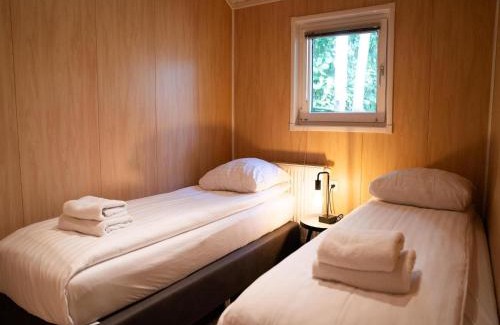 Oirschot Ski Chalet | Lodge in Brabant with Cozy Covered Terrace