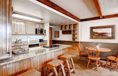 Peak 9 Condo | Lodge-Style Ski-In-Out Condo Perfect for Couples + Heated Pool & Hot Tubs
