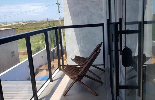 Balneario Gaivota Apartment | loft charmoso com lareira, a beira mar