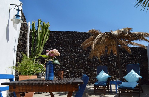 Uga Apartment | Loft-style studio with private, secluded outdoor area in historic finca