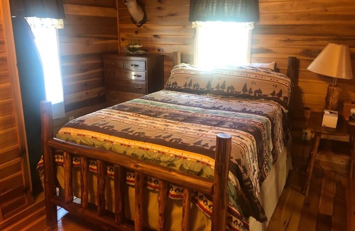 Farmers House | Lofty “Musky Cabin” situated on a hill with musky decor, fire ring, and 2 decks!