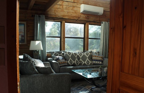 Young Cabin | Log cabin on 2.5 private wooded acres! Bring your horses & ATV's. Hunt area 23