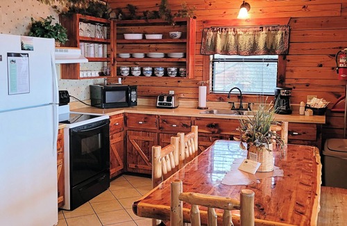 Sylvan Shores Cabin | Log Cabin on Beaver Lake with Boat Dock/Swim Deck/slips