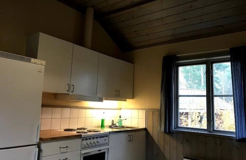 Ramsjo Cabin | Log cabin. Ramsjö Camping . Ångevägen 24. Timber log nearby river stream