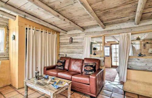 San Cristobal House | Log Casita Overlooking Pond and Waterfall near Taos, New Mexico