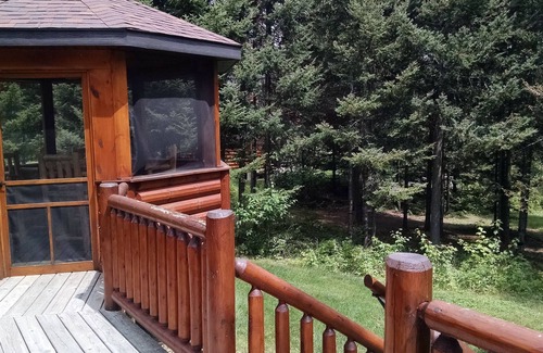 Land O Lakes Ski Chalet | Log chalet executive lodge - wrap around deck lakeside & gazebo on 26 acres