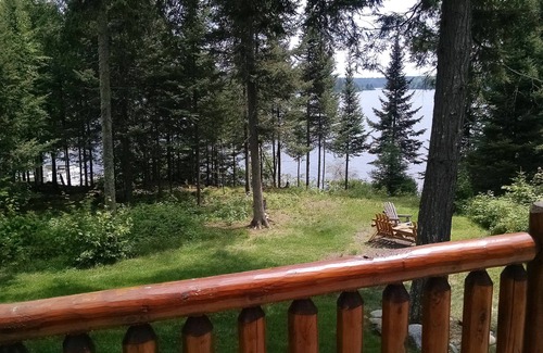 Land O Lakes Ski Chalet | Log chalet executive lodge - wrap around deck lakeside & gazebo on 26 acres