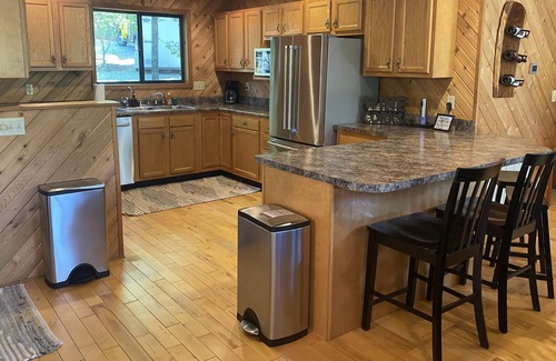 Innsbrook Ski Chalet | Longhorn Lakeside Chalet by Sarah Bernard, Private Dock and Fire Pit