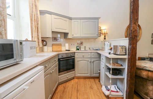 Grange-over-Sands Cottage | LONGLANDS MILKMAID'S PARLOUR, pet friendly, with a garden in Cartmel