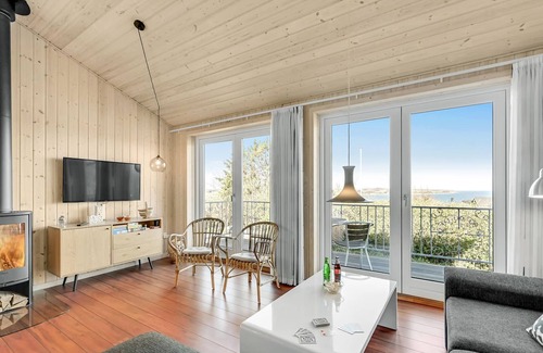 Remmer Strand House | Look forward to a relaxing vacation in this beautiful vacation home by the Limfjord.