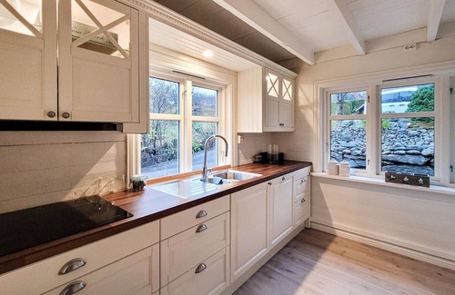 Tysvaer House | Look forward to a relaxing vacation in this vacation home with fjord view.