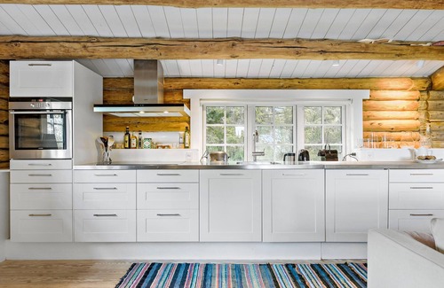 Melby House | Look forward to this charming vacation home in a peaceful setting.
