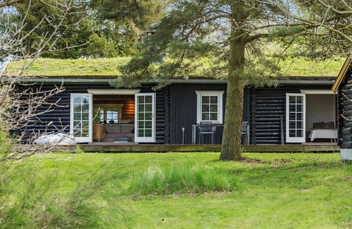Melby House | Look forward to this charming vacation home in a peaceful setting.