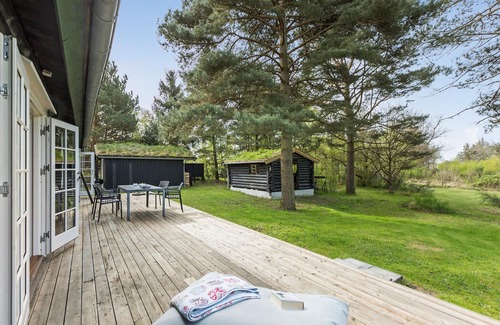 Melby House | Look forward to this charming vacation home in a peaceful setting.