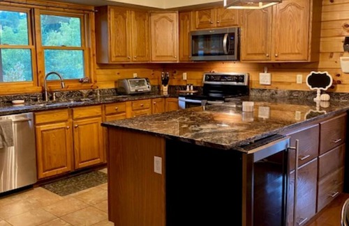 Gatlinburg - Pigeon Forge House | LOOK! Peaceful, updated family cabin! Hot tub/View/Porches/Location/EV charger!