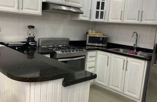 Gregorio Luperon Apartment | Lovely and cozy home with pool and GYM. Located near major Bars and Restaurants