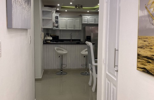 Gregorio Luperon Apartment | Lovely and cozy home with pool and GYM. Located near major Bars and Restaurants