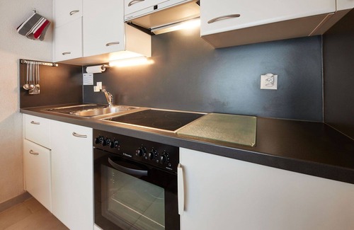 Sion Apartment | Lovely apartment for 4 guests with pool, WIFI, TV, balcony, panoramic view and parking