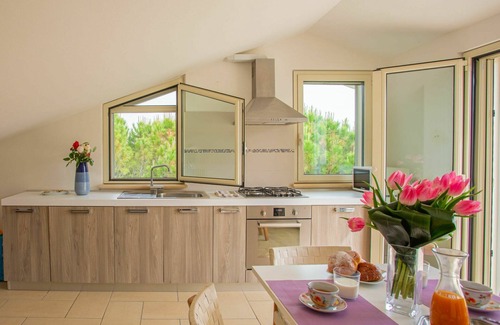 Pineto Apartment | Lovely apartment for 4 guests with A/C, WIFI, TV, terrace, pets allowed, panoramic view and park.